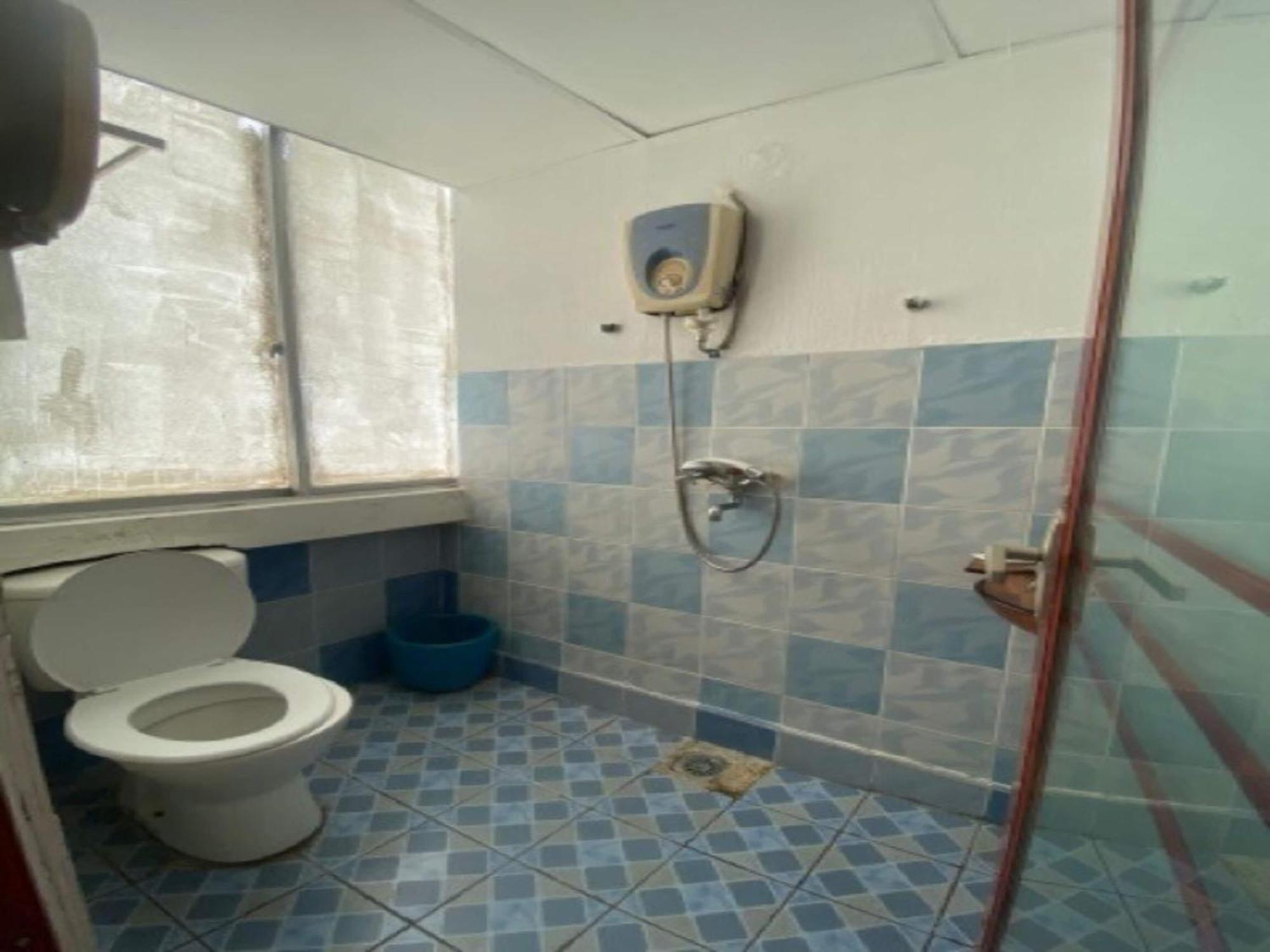 Oyo 90979 Sianglory Inn โกตาคินาบาลู ภายนอก รูปภาพ