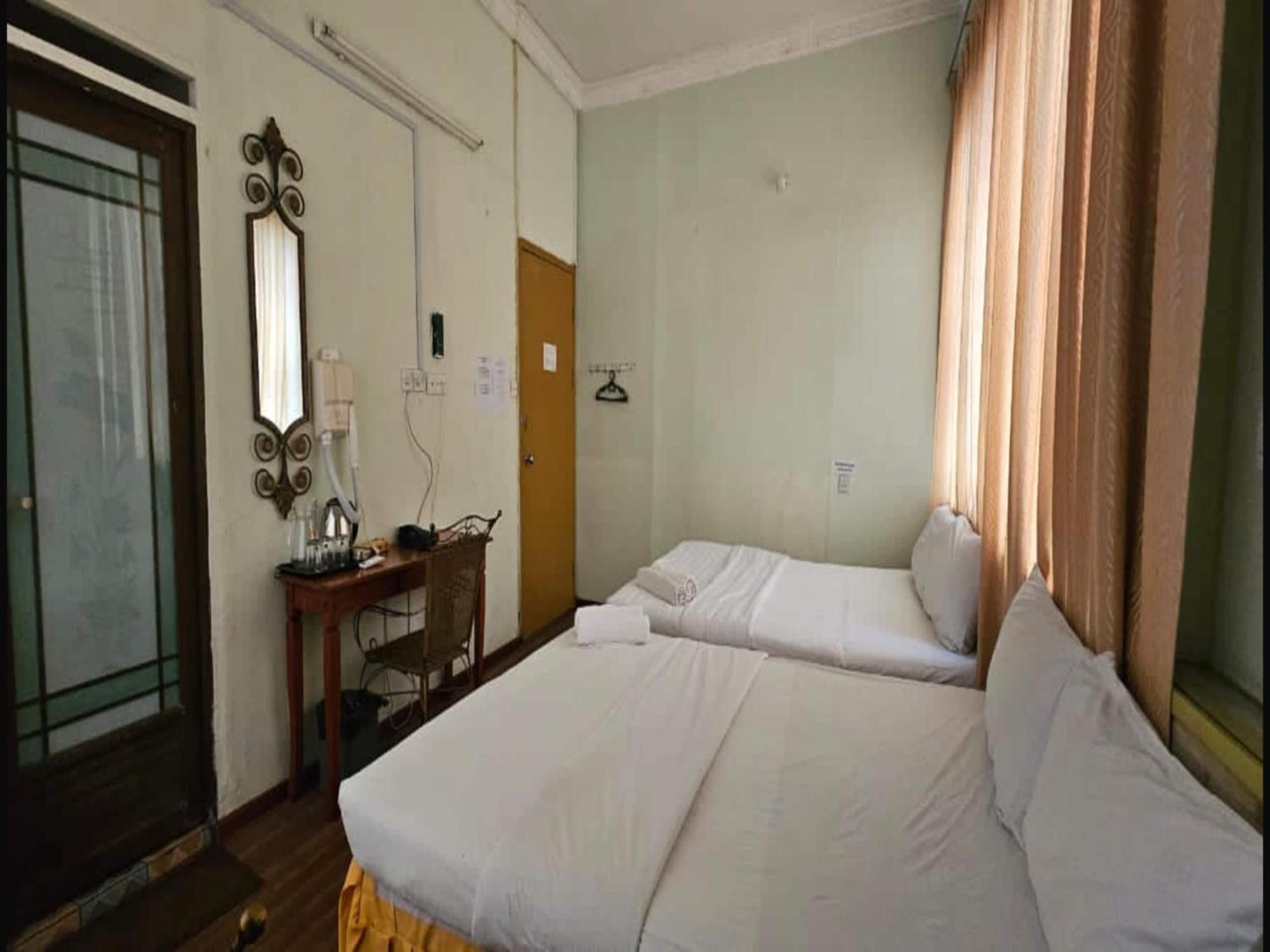 Oyo 90979 Sianglory Inn โกตาคินาบาลู ภายนอก รูปภาพ